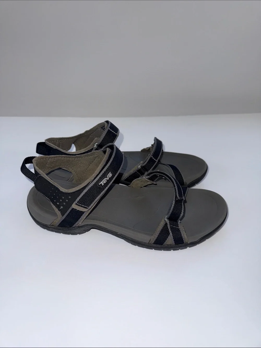 Teva women’s Black and Gray Adjustable Strap Sandals
